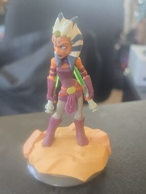 Purple and Cream Female Figurine on Desert Base